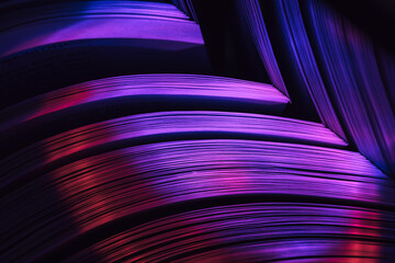 Fototapete - Close up Beautiful book pages in the color light on a night. Background pattern for design. Macro photography view.