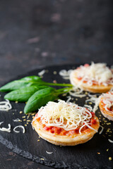 Canvas Print - Mini pizzas with sausages and cheese