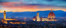 Florence, Tuscany, Italy. Panorama Sunset View At Duomo Santa Maria Del Fiore Cathedral And Palazzo Vecchio Tower. Panoramic View Of Firenze During Sunset. Scenic Landscape Mountains Evening Sky.