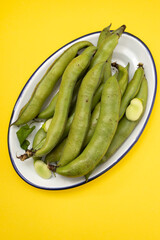 Sticker - fresh green beans in white dish