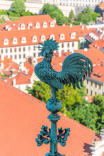 Metal Weathercock Or Weather Vane. Metal Figure Of Rooster. Instrument For Showing Direction Of The Wind. Rooftop Of St Vitus Cathedral, Prague Castle, Czech Republic.