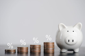 Interest rate financial and mortgage rates concept with icon percentage symbol on the coin. Balance savings and investment.