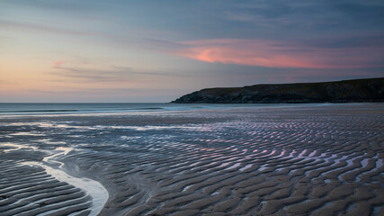 Wall Mural - absolutely beautiful landscape images of holywell bay beach in cornwall uk during golden hojur sunse