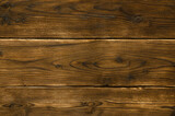 Fototapeta Desenie - Abstract background of dark wooden boards. Closeup topview for artworks.