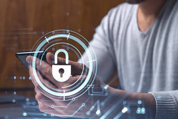 a programmer is browsing the internet in smart phone to protect a cyber security from hacker attacks