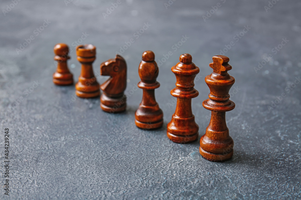 Chess pieces on dark background