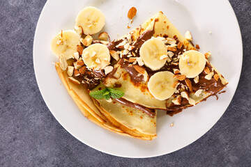 Wall Mural - crepe with chocolate spread,  nuts and banana