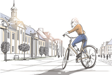 woman riding a bicycle in the city.