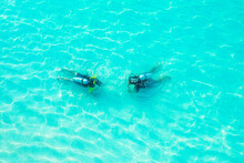 Aerial View Of Two Divers Taking Part In A Course, Maldives.