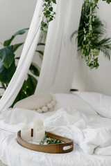 Wall Mural - Candles on tray at white bed in bedroom