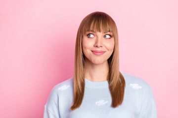 Wall Mural - Portrait of attractive curious cheerful minded girl deciding copy space isolated over pink pastel color background