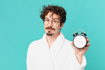 Poster - young crazy man with an alarm clock