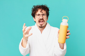 Poster - young crazy man with a coffee thermo