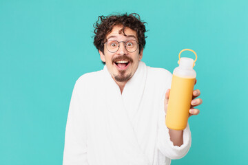 Poster - young crazy man with a coffee thermo