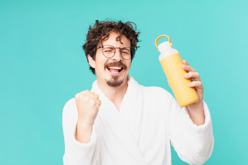 Poster - young crazy man with a coffee thermo