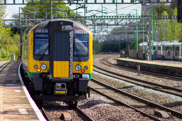 London Midland passenger train leaving Rugeley Trent Valley heading for London Euston Station