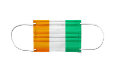 Flag of Ivory Coast on a disposable surgical mask. White background