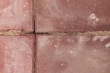 Four reddish concrete slabs - texture