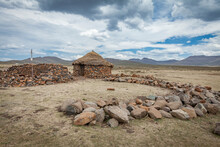 Sani Pass, Lesotho, Africa - 11-30-2020 Shephards Settlement With Straw Covered Houses The Arid Landscape Of Drakensberg Mountain Range In Lesotho, Africa