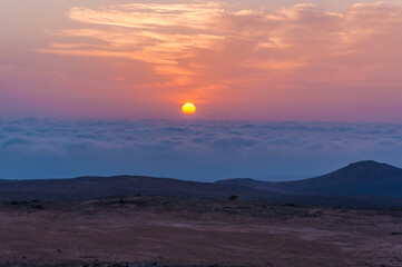 Poster - Sunset over Clouds, photo is taken from the mountains of Salalah, south of Oman