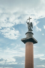 Alexander Column In The Center Of The Palace Square In St. Petersburg, Close-up, On Background Sky.