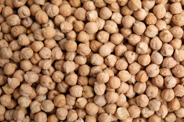 Heap of chickpea as background, top view. Veggie seeds