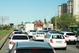 Fototapeta  - Cars in traffic jam on city street