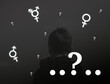 Teen problem Family issues Gender confusion in teenager. A teen boy pointing at gender symbols of male bigender and transgender. Concept of choice gender confusion or dysphoria.