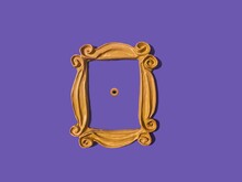 Yellow Frame From The FRIENDS Tv Show Which Was Used Around Monica's Peephole On The Door. Purple Wall. Picture Frame. FRIENDS Television Show Frame