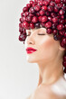 © Svetlana Fedoseeva - Beautiful woman in hat of red berries. Juicy cherries.