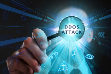 Business, Technology, Internet and network concept. Young businessman working on a virtual screen of the future and sees the inscription: Ddos attack