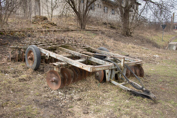 Wall Mural - Old plow for agricultural tractor in Milas, Romania, BISTRITA, 2021,