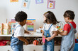 © Rawpixel.com - Young children playing with educational toys