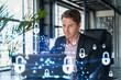© VideoFlow - Handsome businessman in suit at workplace working with laptop to defend customer cyber security. Concept of clients information protection and brainstorm. Padlock hologram over office background.