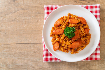 spirali or spiral pasta with tomato sauce