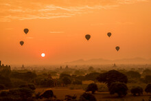 Hot Air Balloons Over Temples Of Bagan, Myanmar At Sunrise.