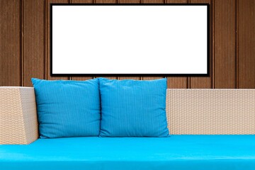 Wall Mural - Blank frames and sofa designs with blue cushions and pillows in a modern home living room