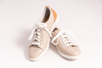 Comfortable sneakers made of beige genuine leather