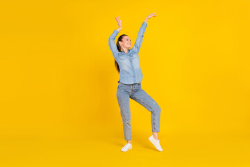 Canvas Print - Full length body size photo young pretty girl dancing at party in jeans clothes isolated bright yellow color background