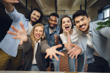 Wall Mural - Happy overjoyed business team celebrate corporate victory