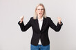 blond pretty woman shouting aggressively with an angry expression. business concept