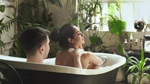 Young Couple Taking An Hot Bath In A Tropical Destination
