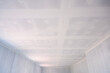 White ceilings and empty rooms or buildings Construction and gypsum ceiling paint putty inside the house and building. Concept: internal construction of a housing project