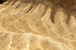 Detail of rocks with incredible pattern of zabriskie point - Death Valley