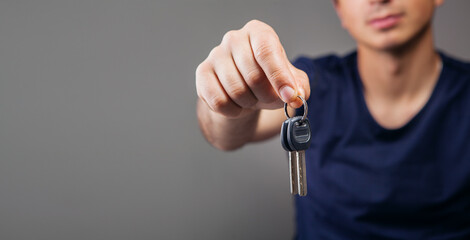 Wall Mural - man holding keys