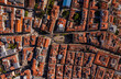 Directly above of red roofs of buildings in historic center of city. Houses and streets from drone, Lisbon, Portugal.