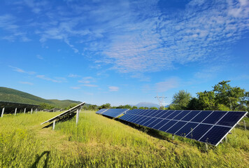 Poster - solar panels grass sky clouds electricity energy