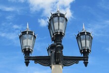 Vintage Street Lamp On Blue Sky Background