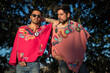 © Luis - Pareja gay vistiendo con ponchos artesanales