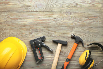 Set of tools on wooden background